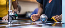 A student using the Sphero BOLT Coding Robot.